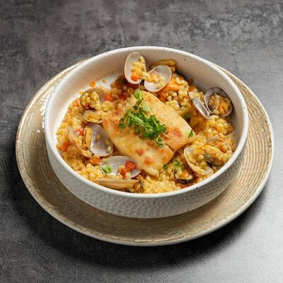 Палтус с птитимом и морепродуктами в Everest Sochi по цене 1380 ₽