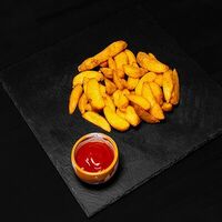 Картофель по-деревенски в Veranda Bar