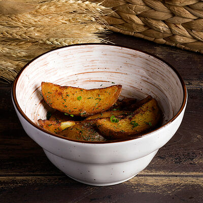 Картофель по-домашнему с аджикой в PRO.Хинкали by Novikov по цене 390 ₽