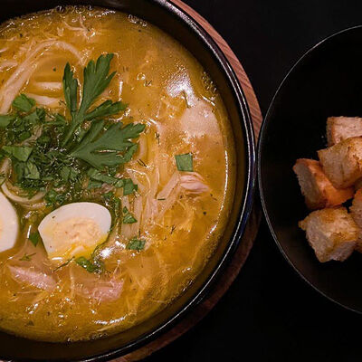 Лапша куриная с яйцом и гренками в Ostroff по цене 160 ₽