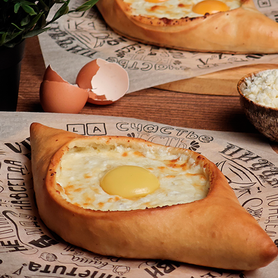 Хачапури по-аджарски в Dym Dymych Lounge по цене 660 ₽