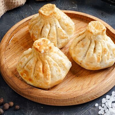 Хинкали жареные с говядиной и свининой в Чинтамани по цене 530 ₽