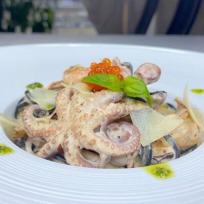 Спагетти с морепродуктами в Мансарда по цене 1050 ₽