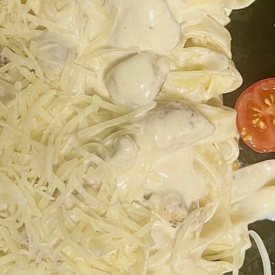 Паста ПилМэН с курицей, креветками и вешенками в Пилмэн по цене 850 ₽