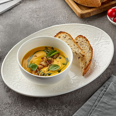 Крем-суп из тыквы на кокосовом молоке с креветками в Lava по цене 600 ₽