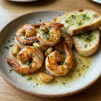 Тигровые креветки с чесноком в Место Про Тесто