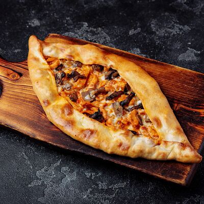 Пиде с курицей и грибами в Meat Feast по цене 1050 ₽