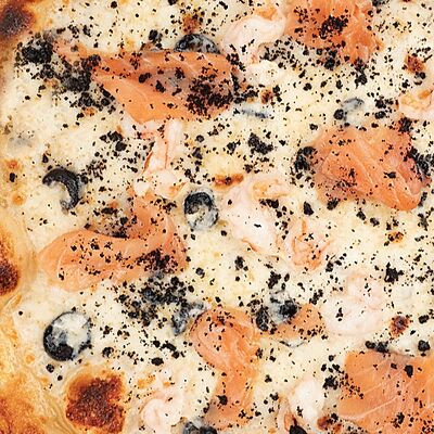 Пицца с лососем, креветками и мидиямив Тальятелло по цене 900 ₽