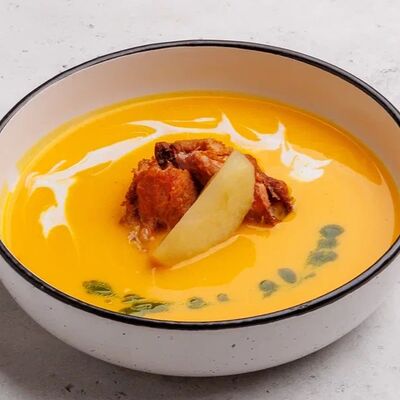 Тыквенный суп с крыльями конфи и пашированным яблокомв Амстердам по цене 395 ₽