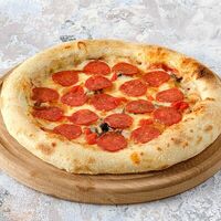 Пицца Пепперони в Casa Mia Халва Тсуру