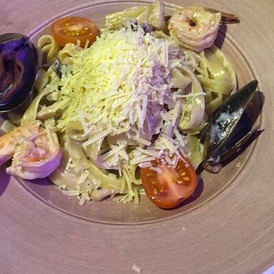 Феттуччине с морепродуктами в Oscar по цене 690 ₽