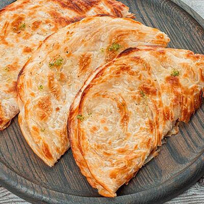 3 слоёные лепёшки роти в Yunga Tim Fish & Grill по цене 590 ₽