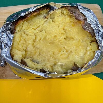 Картофель, печенный с сыром и маслом в Картошка по цене 220 ₽