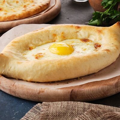 Хачапури по-аджарски в Mangal House по цене 470 ₽