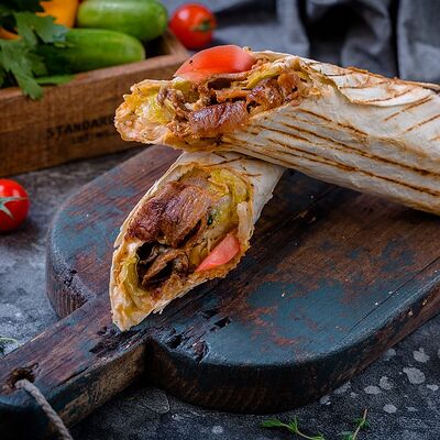 Мегашаурма Микс с курицей и ягненком в лаваше в Сахара по цене 1495 ₽