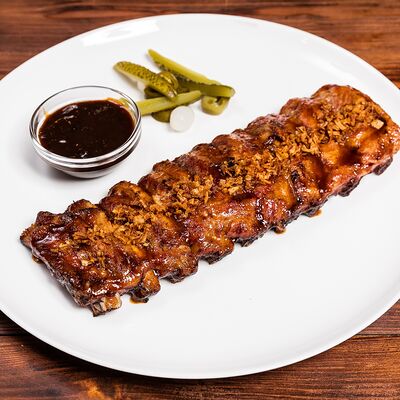 Свиные ребра гриль в Трактир Колесо по цене 1017 ₽