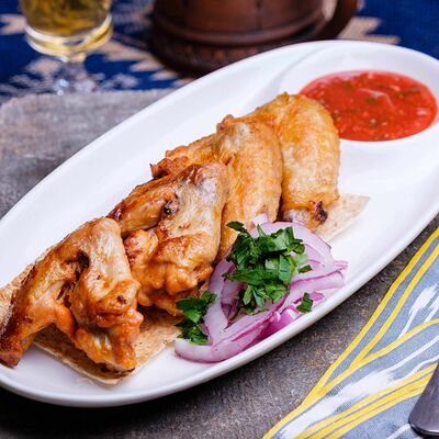 Куриные крылышки в Кафе кавказской кухни Хурма по цене 395 ₽