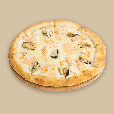 Пицца с морепродуктами в Любим сытно по цене 1020 ₽