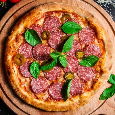 Пицца Дракон в Капуцин Кирова по цене 620 ₽