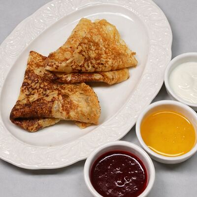 Блин со сгущённым молокомв Мёд и Масло по цене 319 ₽