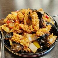 Китайские Кальмары на чугуне в Мир