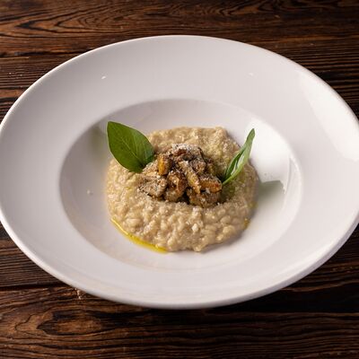 Ризотто с белыми грибами в Luciano по цене 1190 ₽