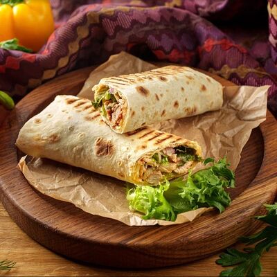 Шаурмаури из курицы и свинины в КинZa-Dза по цене 490 ₽