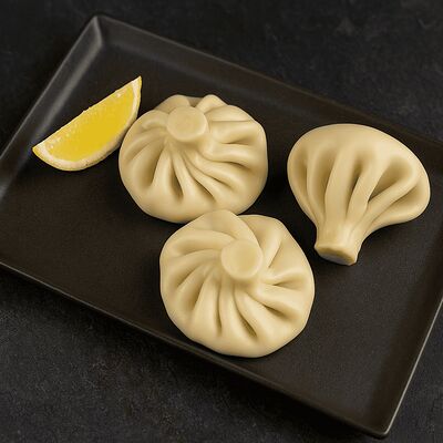 Хинкали из семги в Колхида Palace по цене 630 ₽