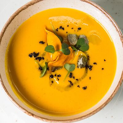 Крем-суп из тыквы с креветками в Family kitchen по цене 690 ₽