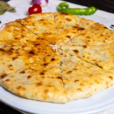 Къабускаджын - Пирог с капустой и грецким орехом (маленький) в Шафран по цене 535 ₽