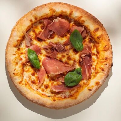Пицца Прошутто Крудо в Тепло по цене 1030 ₽