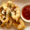 Кольца кальмаров с пармезаном и соусом сальса в Поляна по цене 880