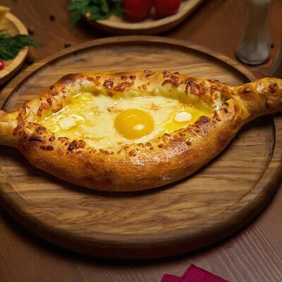 Хачапури по-аджарски в The Кухня по цене 550 ₽