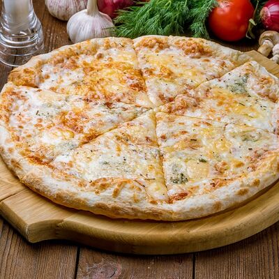 Пицца Четыре сыра в Триумф по цене 350 ₽