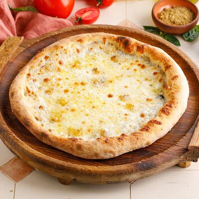 Пицца Четыре сыра в Сули Гули по цене 650 ₽