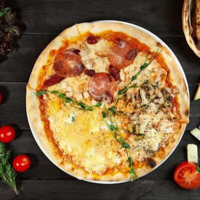 Пицца Ассорти в Чентуриппе по цене 915 ₽