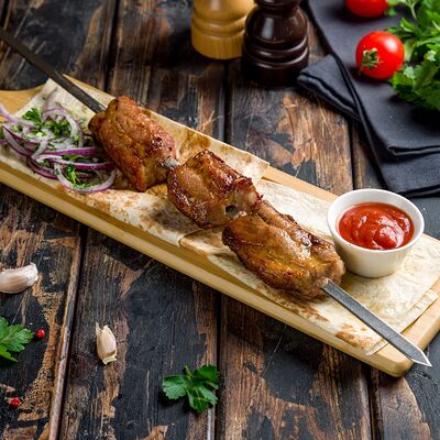 Шашлык из свиных семечек в ШаурМангал по цене 480 ₽