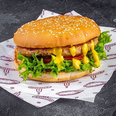 Чизбургер куриный в Вкусно место по цене 530 ₽