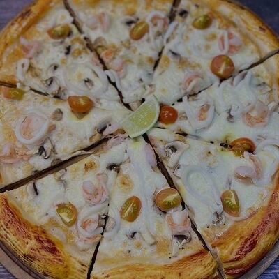 Пицца Том-ям в Вкусное место по цене 890 ₽