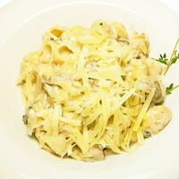 Лумаке Альфредо в сливочном соусе с грибами в Tempo Della Pizza