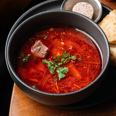 Борщ с говядиной в Густо & Пряно по цене 528 ₽