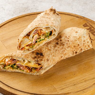 Пицца-ролл с охотничьей колбаской в ТОПКА Пицца на дровах по цене 850 ₽