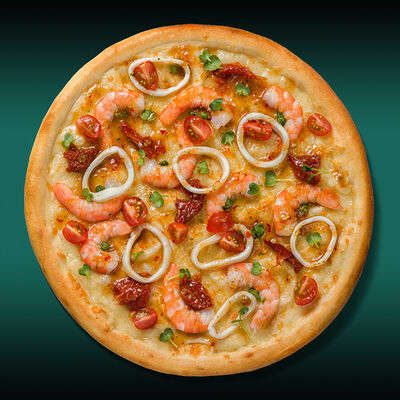 Пицца с морепродуктами и сливочным соусом в Нияма по цене 759 ₽