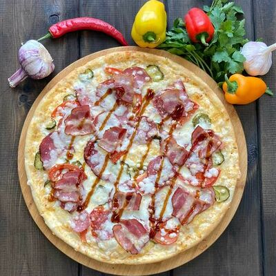 Фирменная в Pizza Shop по цене 580 ₽