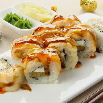 Сяке Урамаки Гриль ролл в Kushi-Sushi по цене 523 ₽