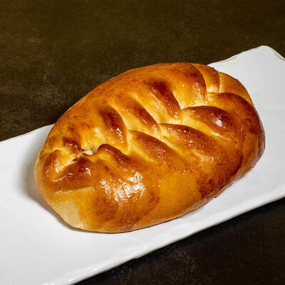 Булочка с яблоком в Домашняя кулинария по цене 140 ₽