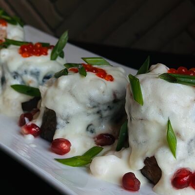 Запеченная форель с креветками в сливочном соусев Тбилисио по цене 1510 ₽