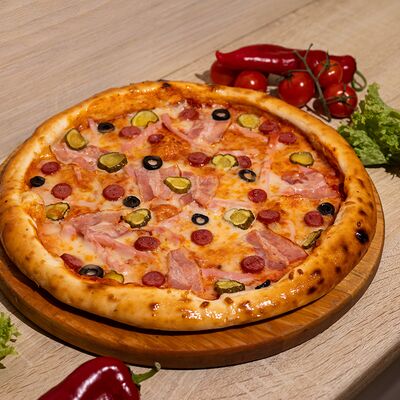 Пицца Мясное ассорти в Плюшка ватрушка по цене 650 ₽