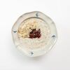 Овсяная каша с клубничным вареньем и лепестками миндаля в White Fox Cafe по цене 615