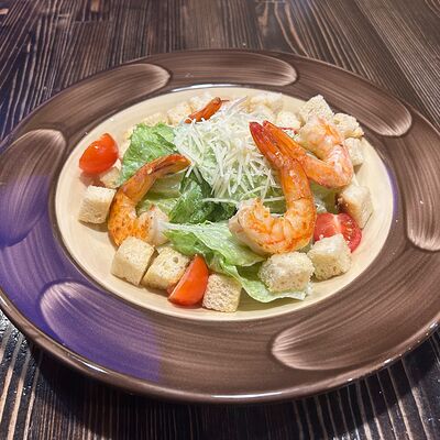 Салат Цезарь с креветкамив Бардак Бар по цене 760 ₽